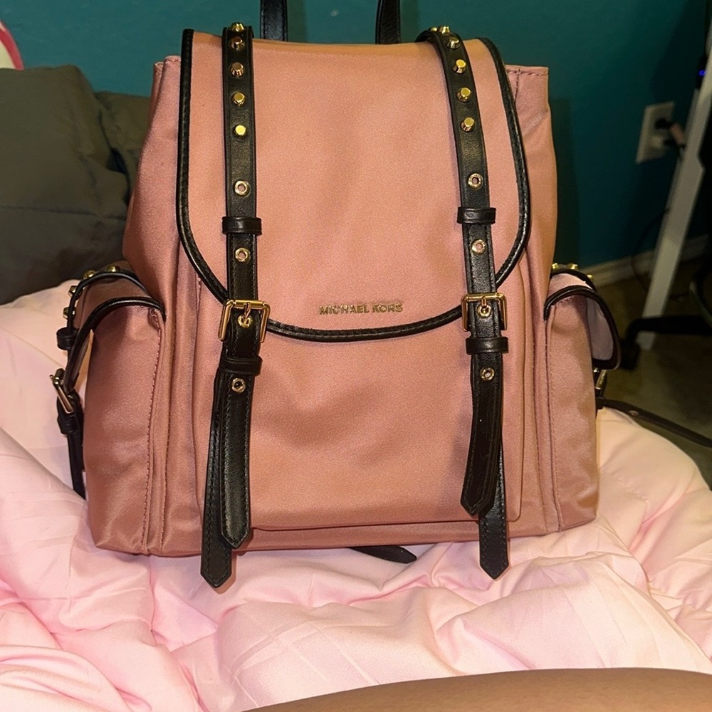 Michael Kors Pink and Black Backpack with Flap Closure and Decorative Straps